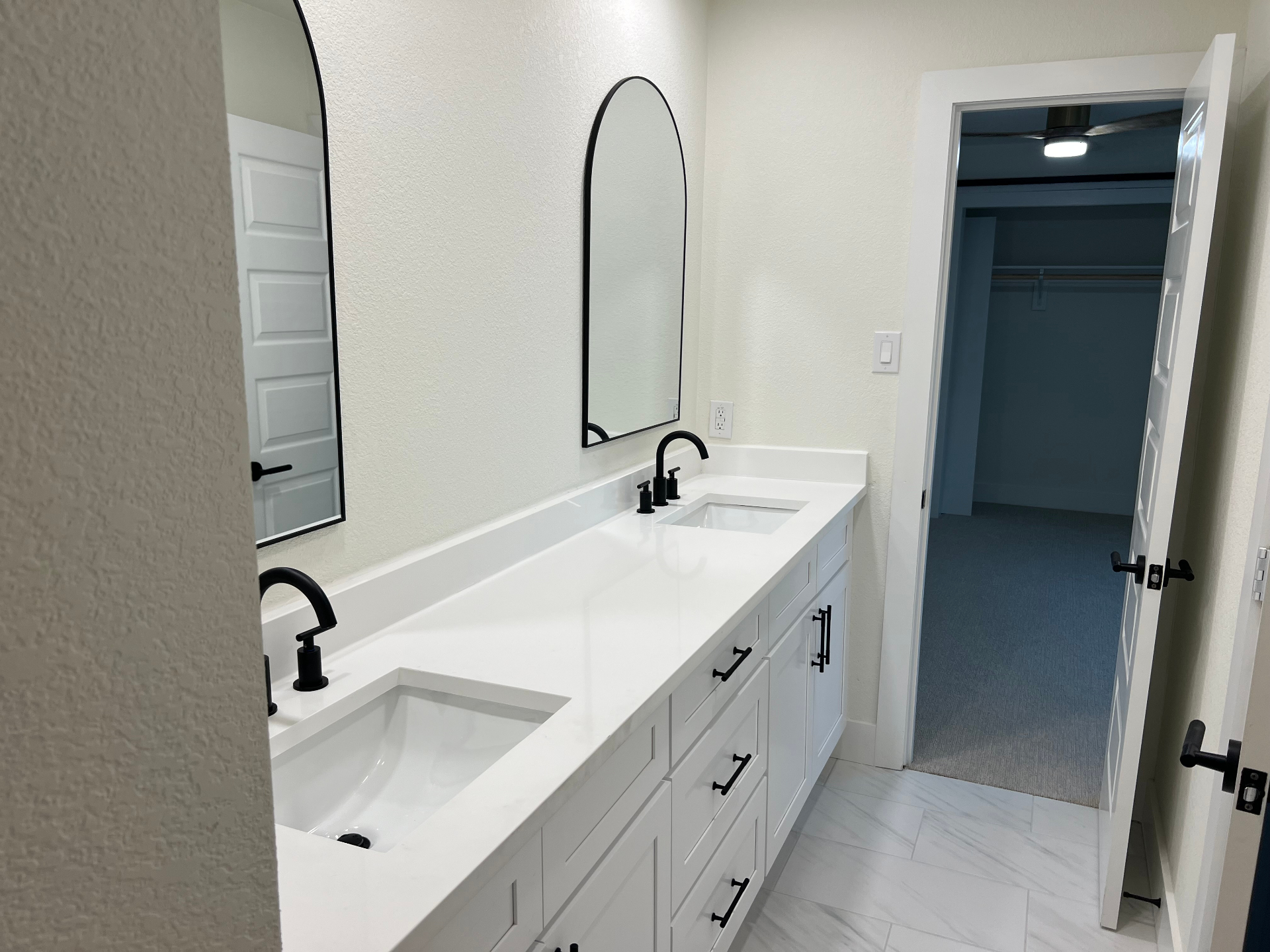 Arched Mirrors Double Vanity in Prosper, TX by SHADELE Design & Remodeling