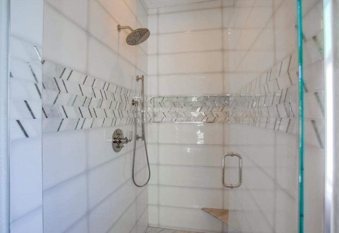 Marble Chevron Shower Detail in Frisco, TX by SHADELE Design & Remodeling