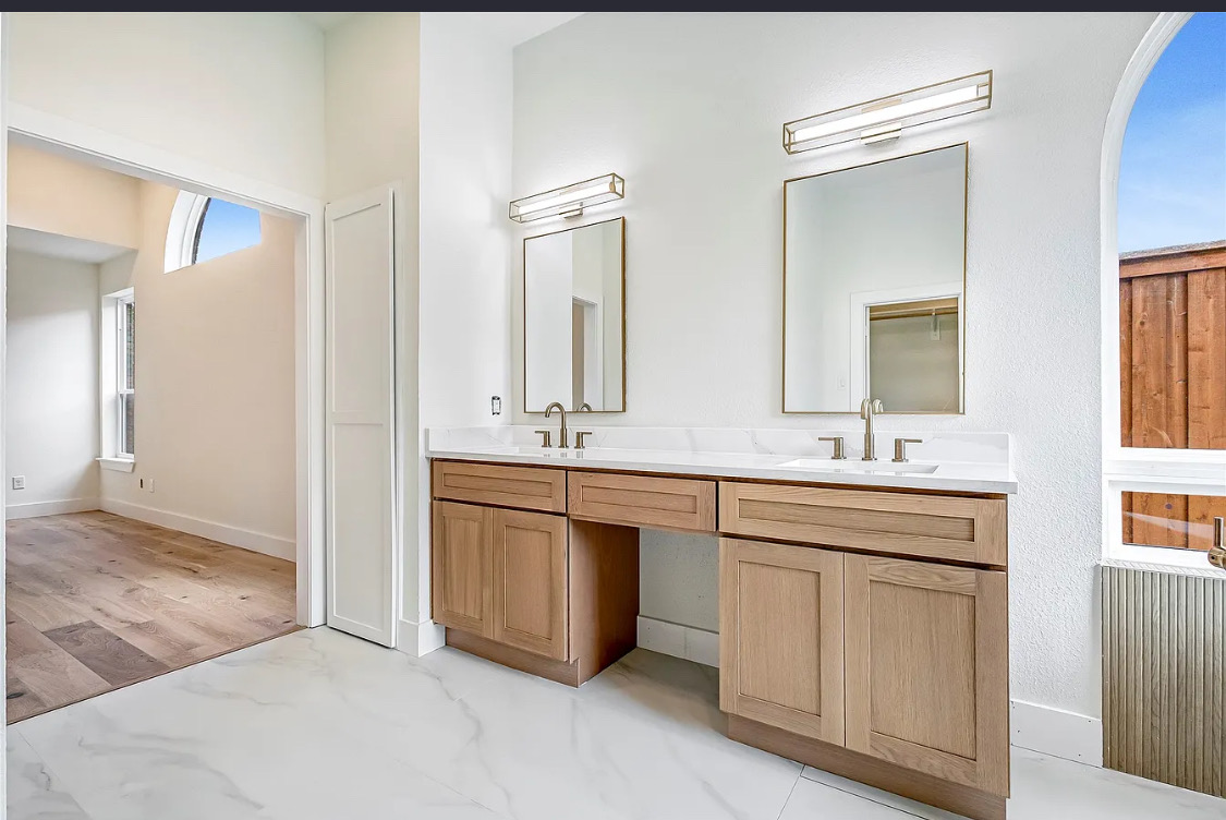Oak Double Vanity with Brass in Prosper, TX by SHADELE Design & Remodeling
