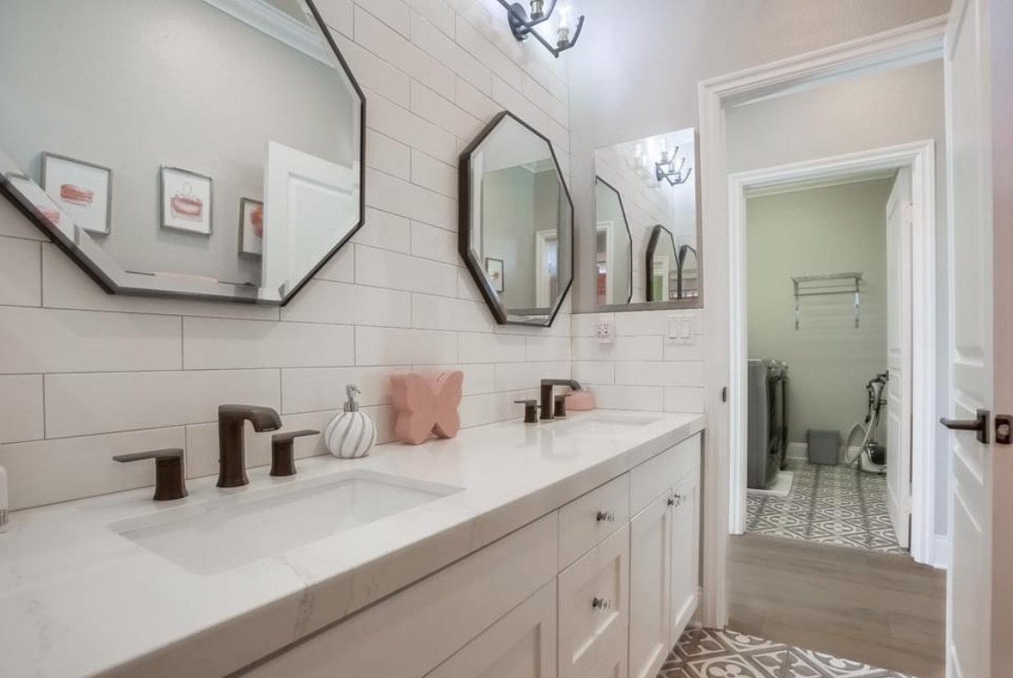 Kids' Bath with Octagon Mirrors in Prosper, TX by SHADELE Design & Remodeling