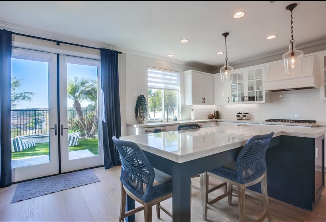 Coastal Kitchen with Navy Island in Prosper, TX by SHADELE Design & Remodeling