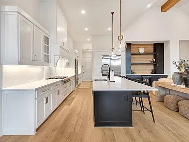 Bright White Kitchen with Navy Island in Prosper, TX by SHADELE Design & Remodeling