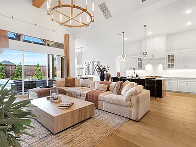 Great Room Open to Kitchen in Frisco, TX by SHADELE Design & Remodeling