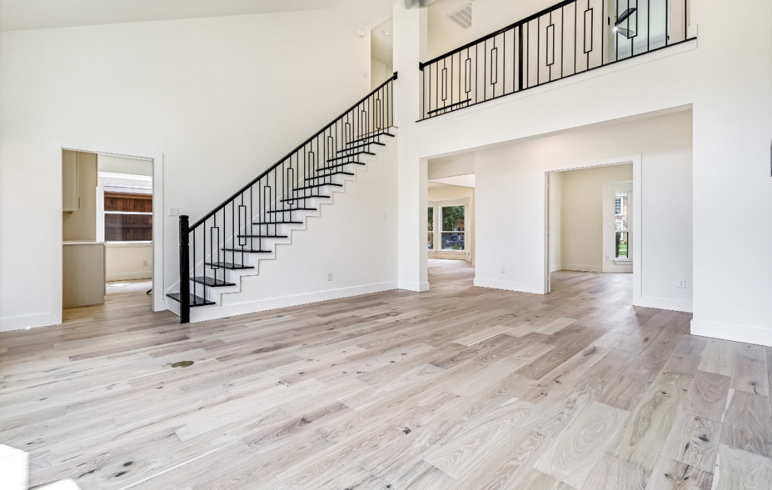 Modern Iron Staircase in Prosper, TX by SHADELE Design & Remodeling